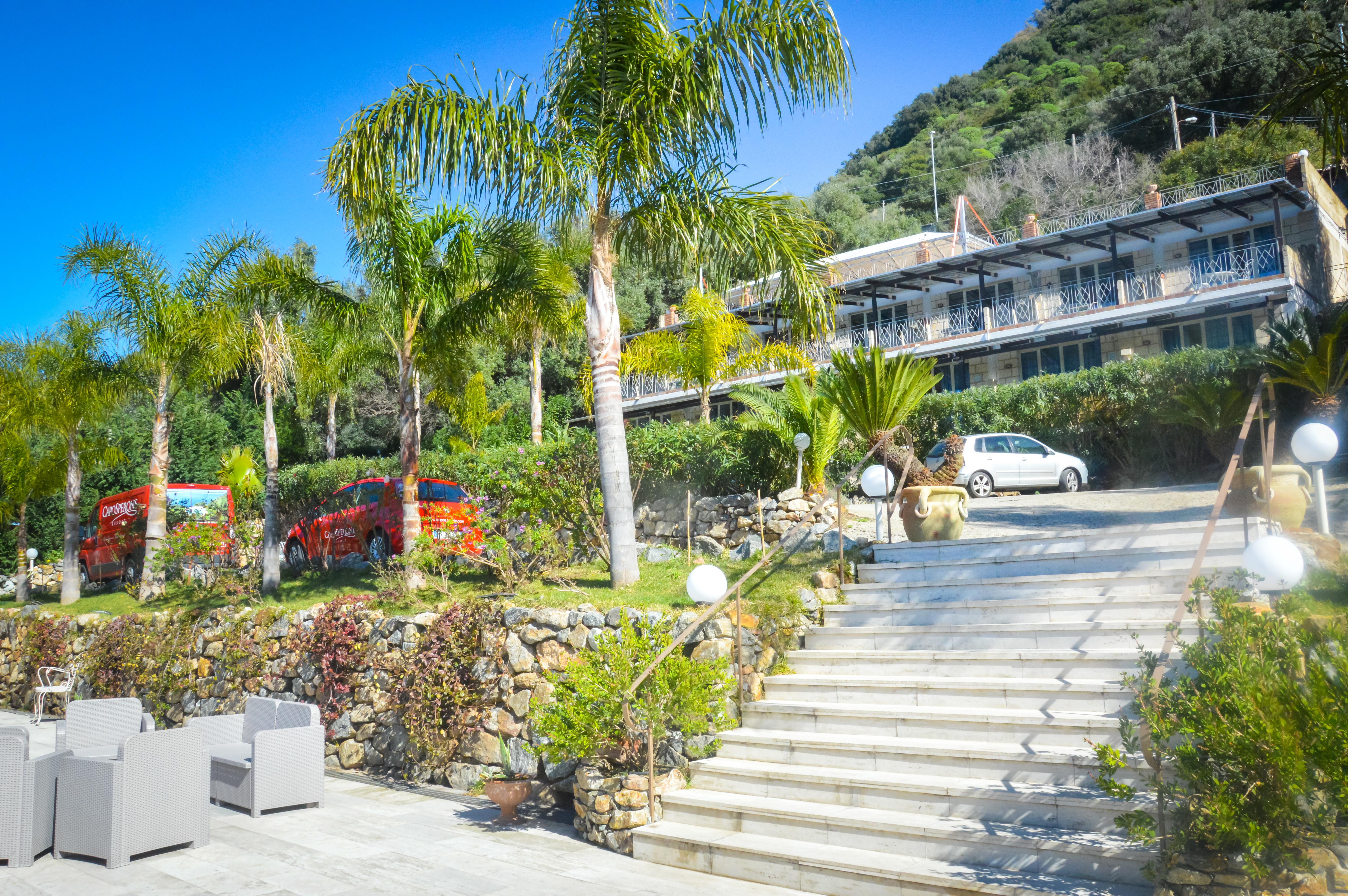 Caposperone Resort Пальмі Екстер'єр фото